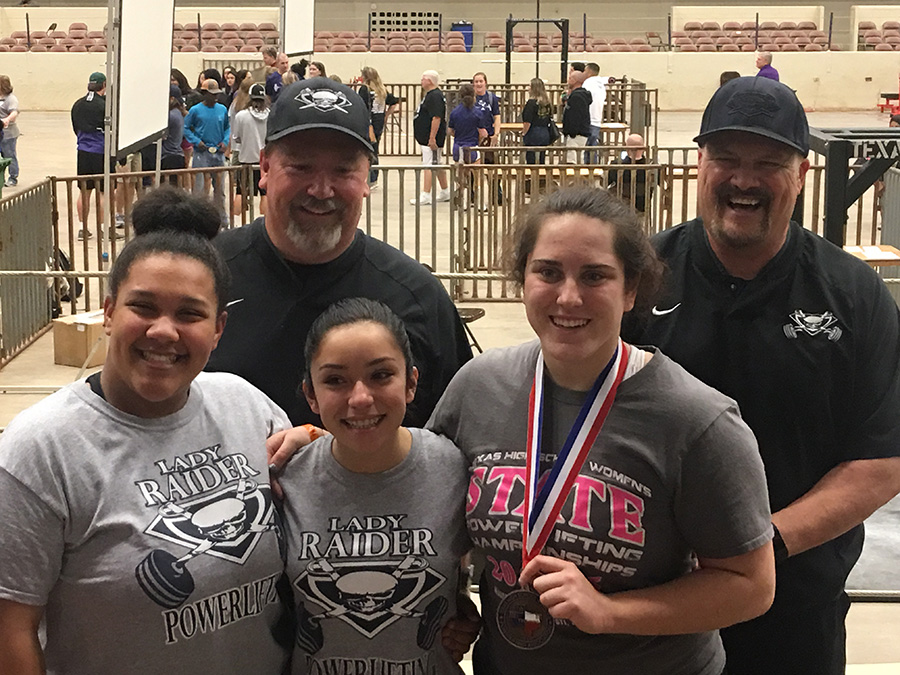 Breaking barriers \\ Standing proud, the powerlifitng team had major success at the State meet held in Waco March 17.
