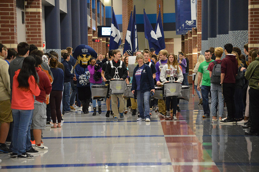 Away to state \\ Getting recognized for heading to state, both athletes and scholars were celebrated during the send off Feb. 21. “That’s the first time I was actually inside the send off instead of being one who was cheering,