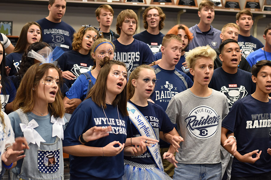 Starting over \\ The choir, the band, JROTC and the cheerleaders recorded the Alma Mater and Fight Song for the school to learn Aug. 31. As the first year with new Head Choir Director Mr. Nathan Dame, the choir department has revamped the style. Prestige, the school’s show choir, has now changed to Out of the Blue.