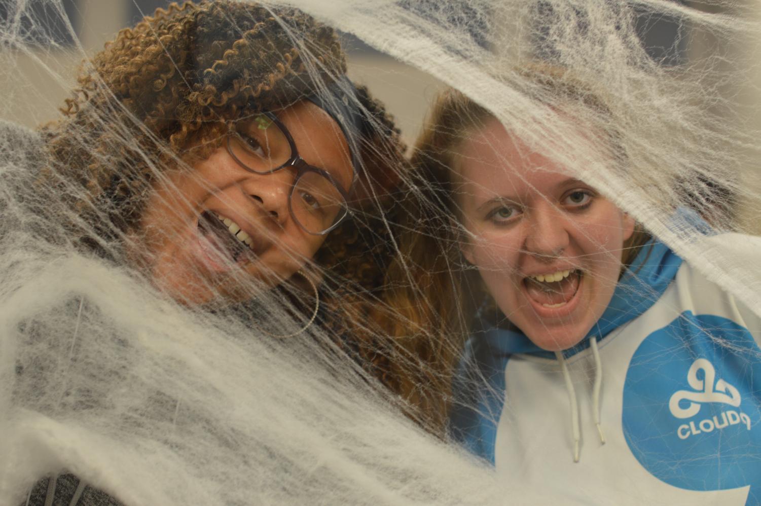 In a web of notes \\ Sophomores Alejah Evans and Amberlyn Warren put up Halloween decorations in the choir room Sept. 26. The Sigma girls meet in the choir room every Wednesday. They also made favor bags for the judges for All-State auditions taking place Oct.2.