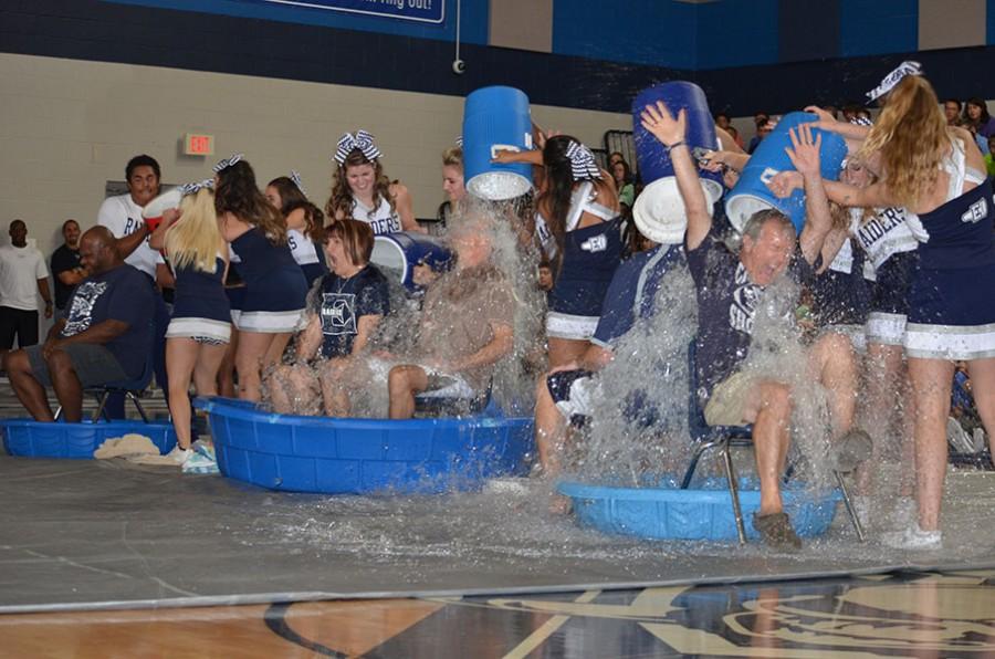 Mr.+Freeze+%5C%5C+Accepting+the+ALS+ice+bucket+challenge+from+Matrix%2C+the+principals+get+drenched+by+the+varsity+cheer+squad.+I+put+on+an+act+for+the+kids%2C+Principal+Mike+Williams+said.+I+just+wanted+them+to+be+excited+about+it.