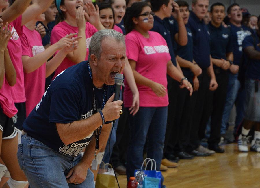 Scream, shout, let it all out \\  Revving up the student body at the cross-town showdown game Mike Williams yells Wylie East High School is the best high school in the state of Texas, to end the raider rumble Oct. 3. 
photo by Caroline Witty