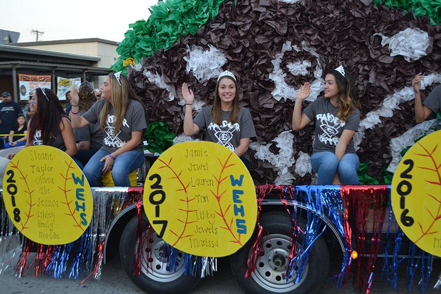 We are Queens of the Diamond \\ The softball team won first place for their homecoming parade float. The softball players wore crowns and waved to the crowed as they passed by. 
photo by Bailey Manby 
