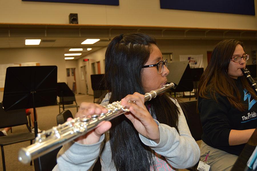 Practice makes perfect \\ Freshman Maria Campos prepares for her ensemble, playing her piece Gavotte.