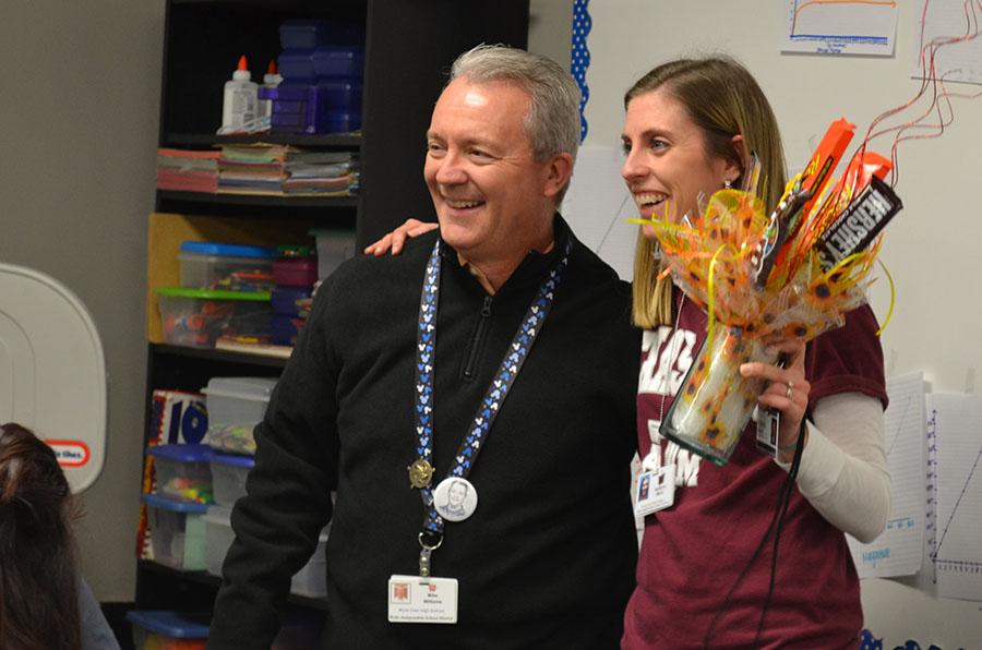 Razzle dazzle \\ An emotional Mrs. Robyn Bray is surprised by Principal Mike Williams and his announcement of  her receiving teacher of the year. 