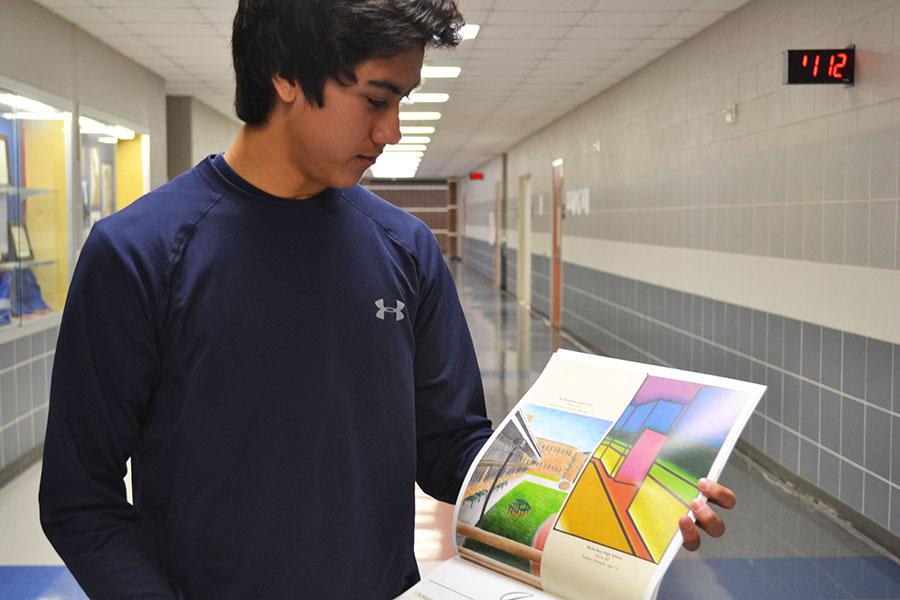 Surprised Schoeck \\ Unknown to sophomore Nathan Schoeck, art teacher Angela Gilpin entered his artwork into the PBK Architectural Calendar Art Contest. Schoecks illustration won and will be featured in the 2015 calendar. 