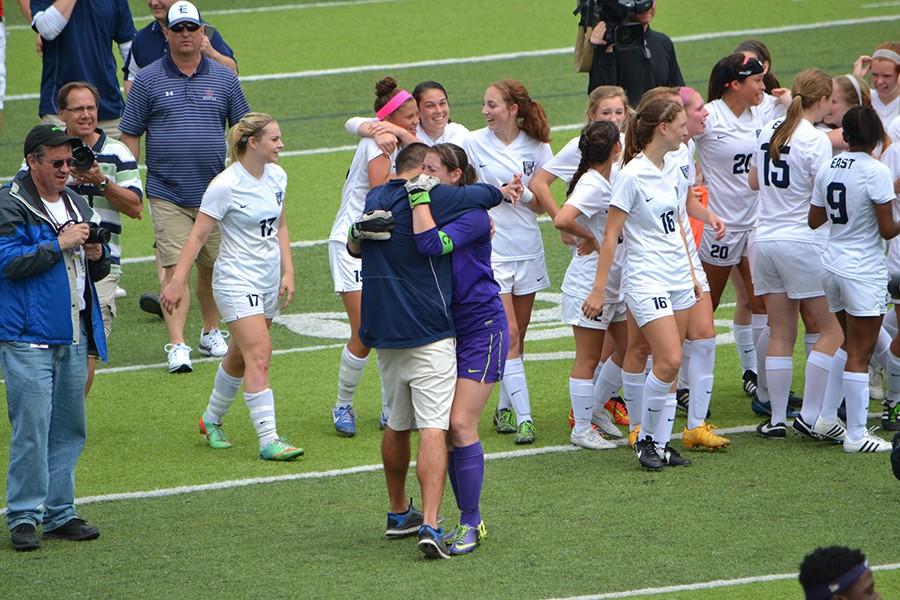 Power+of+a+hug+%5C%5C+Celebrating+the+State+Championship+win%2C+senior+Brooke-Lynn+Scroggins+and+coach+Matt+Tietjen+embrace.+The+girls+soccer+team+brought+home+the+schools+first+ever+State+Championship+April+18.