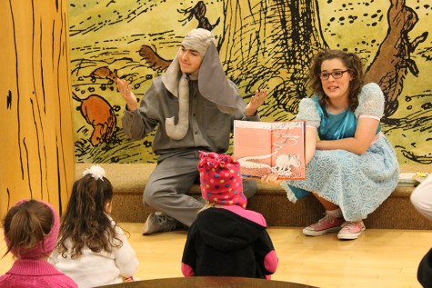 Top of the chart \\ Freshman Lizzy Jurden won a Tops in Texas award from UIL Interscholastic League Press Conference in the Entertainment Photo category for this photo she took of junior Clay Mobley and senior Ellie Jurden reading to children at Barnes & Noble to promote their play, Seussical the Musical. This is the highest honor a student can receive in the state competition.
