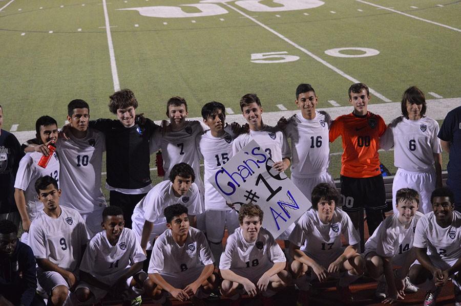 On our way \\ Varsity boys soccer takes a moment to celebrate as a team after defeating Rockwall Heath 4-2 in their second playoff game.