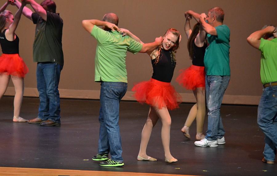 Rad dad \\ Sophomore Sierra Vance dances with her dad in the annual Father Daughter dance.