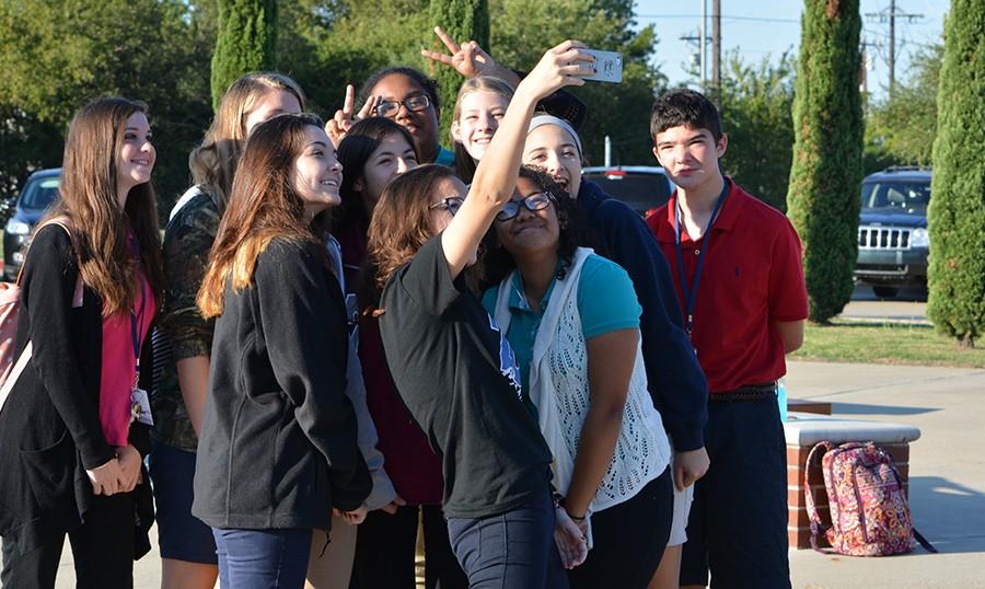 See me \\ After See You at the Pole commences, students take a selfie to remember the occasion.