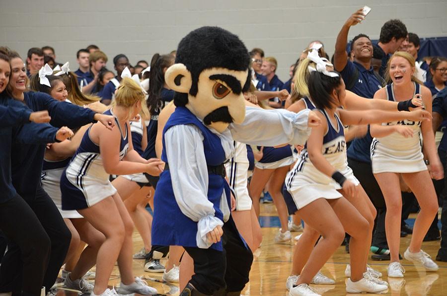 Rambo rumble \\ Jamming to the hit song “Watch Me” Rambo leads the cheerleaders, Sapphires and football team in executing the song’s dance. Not only did Rambo help lead the football players in the dance, but also to victory against Red Oak 49-7 Aug. 28.