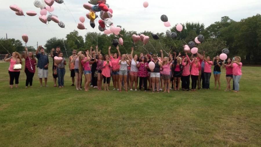 Cammie Snow Stretch, who was fatally shot Sept. 18, is remembered by friends and family  with the release of pink and zebra print balloons.
