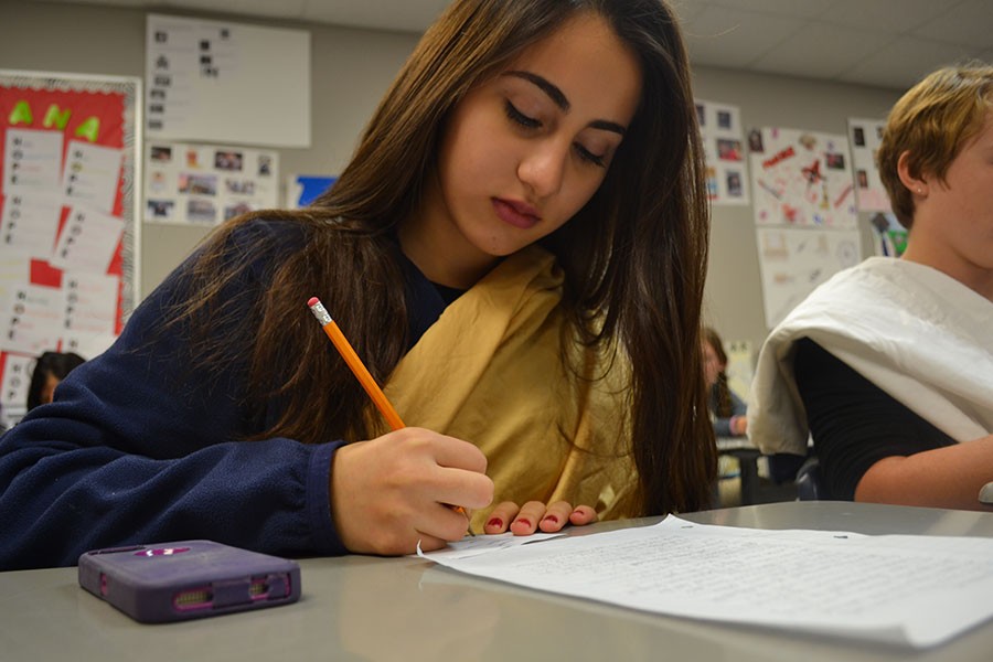 A chosen one // Writing down the name of one of her classmates, sophomore Bianka Rodriguez paid close attention to detail. She was one of the eight students chosen to read their speeches aloud to the class, but when the time came to vote, did not vote for herself, but for her deserving peer.