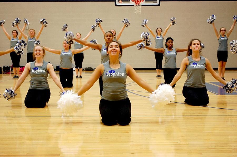 Ready, Okay \\ Preparing for competition, the Sapphires practice their pom routine at early morning practice.
