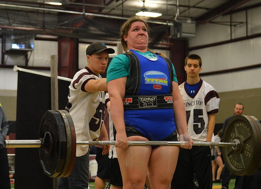 Heavy weight \\ Senior Marion Wright competes in the Princeton powerlifting meet and wins first place in her weight class Jan. 23. Lifters are coached by John Mitchell.
