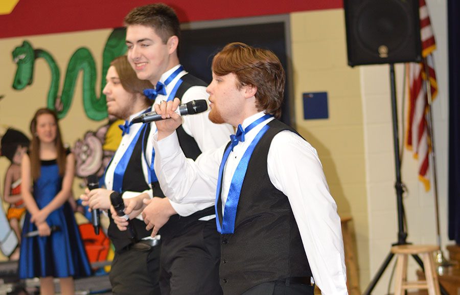 Music scholars \\ Seniors Clay Mobley and Randy Points perform at Birmingham Elementary with  Prestige. The pair will receive a statewide music scholar award May 10.