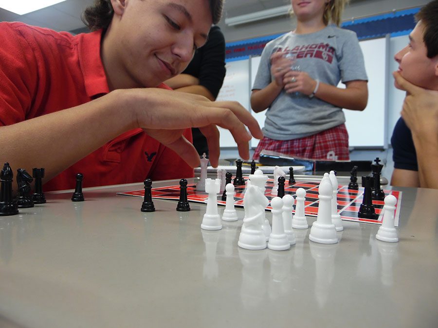 Best chess \\ Junior Matthew Acuna plays chess at the newly-formed clubs meeting Oct. 3.