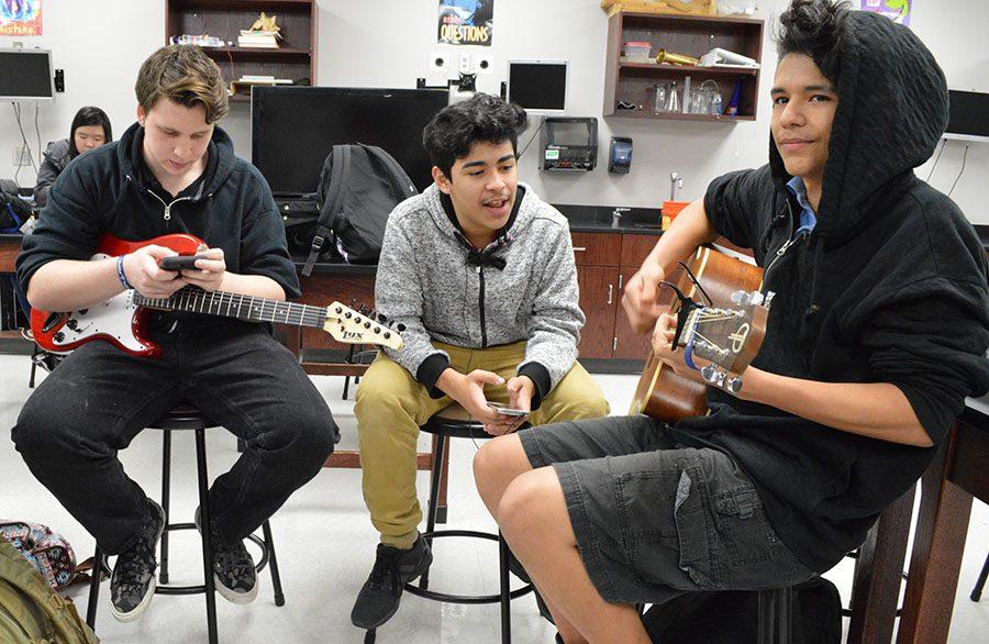 Music makers \\ As a new club on campus, Rock Club members meet to play music together every Friday in room 852 during Power Hour.
