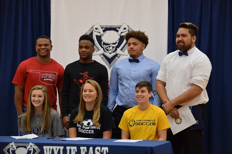Off to play \\ Seniors are off and ready to move to the next level in sports. Seniors from both soccer and football committed to a college on National Signing Day Feb. 1.