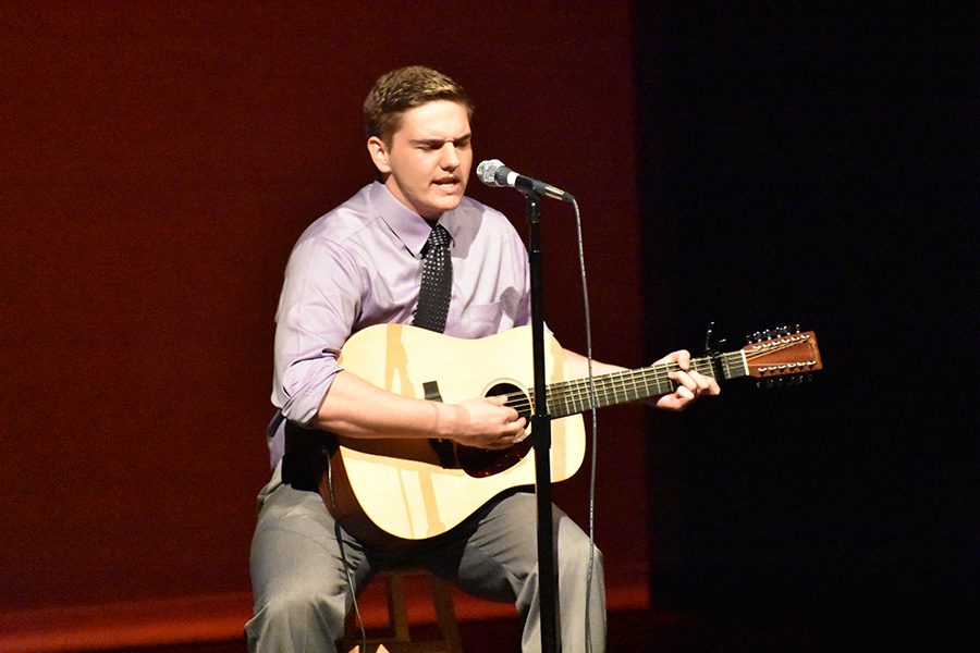 Cat lady \\ Singing his original song Cat Lady, junior Alex Fowler performs in the 2017 Talent show March 16.
