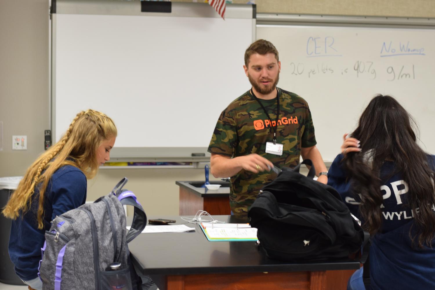 Head of the class // Teaching chemical measurements, Mr. Zach Neu is a first-year teacher and a former Raider.