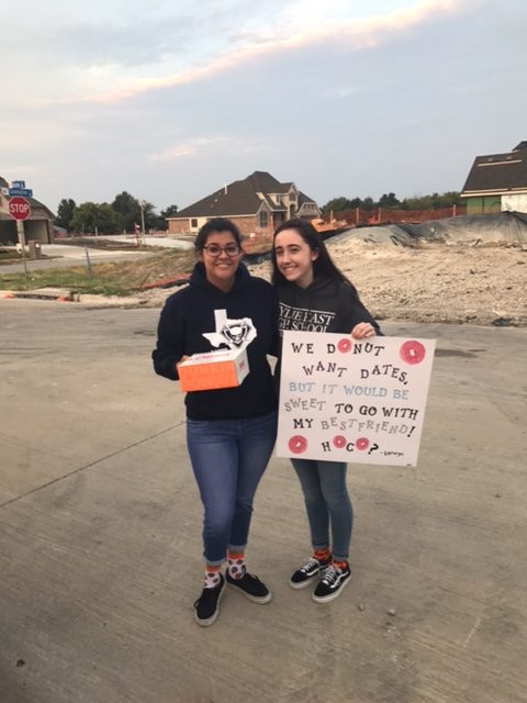 Friendposal+%2F%2F+Junior+Kamryn+King+asks+senior+Karen+Tovar+to+homecoming+after+picking+her+up+from+school+Sept.+27.+%E2%80%9CIt+was+so+cute%21+Kamryn+is+so+sweet+and+I+was+shook+when+she+asked+me%2C%E2%80%9D+Tovar+said.