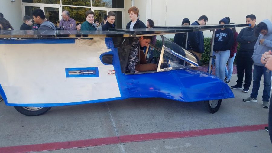 Showing off \\ While attending the annual specialty workshop Jan 13, the solar car team was able to show off last year’s car to teams who will b participate in this year’s Solar Car Challenge. 
