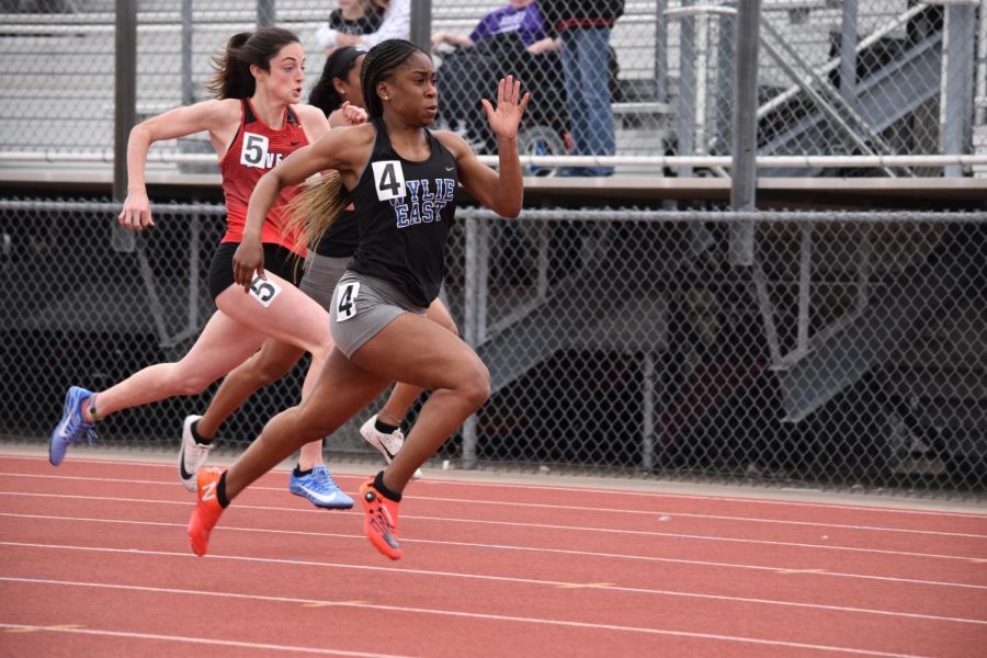 Fly by // Junior Destini Jeter runs during the District 10-5A Track & Field Championship meet April 3. Jeter ran her 300 meter hurdles race in 42.36 and will be advancing to the Area meet.