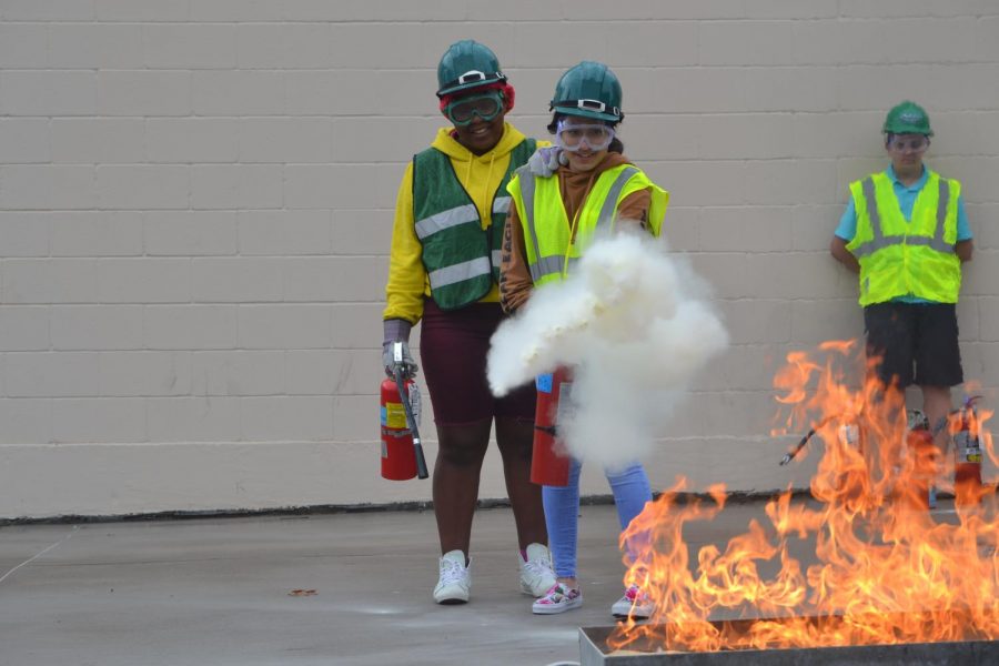 Girl on fire \\ Freshmen Karyss McKeel and Daniela Herrera learn CERT, a program which trains members to help the community in absence of first responders. It empowers me [and] makes me feel like I can help others, Herrera said.