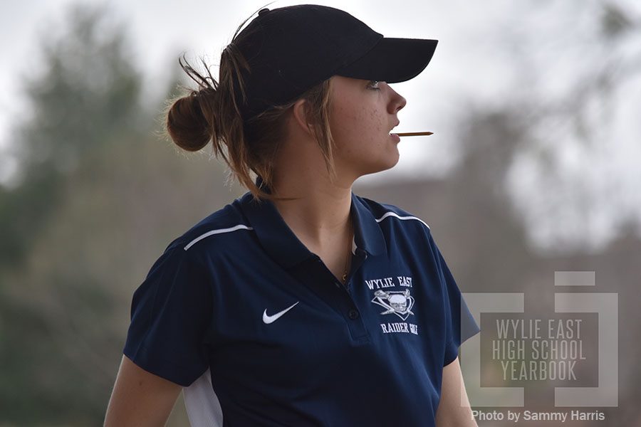 Watching it fly \\ Sophomore Katelyn Sawyer sees how far her ball goes after chipping it onto the green,  later putting for Bogey. Varsity girls placed fourth. Sawyer shot a 112. The Golf team is on the road again to Heritage Creek in Fairview Feb. 11.  