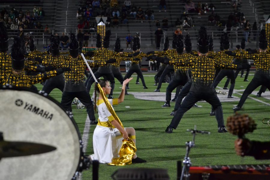 When in Egypt // Performing the pre-show, the band faces the back field and prepares to play the opener in the 2018-2019 show, Conquered. The color guard decorated the band, fully setting the scene for the show. 