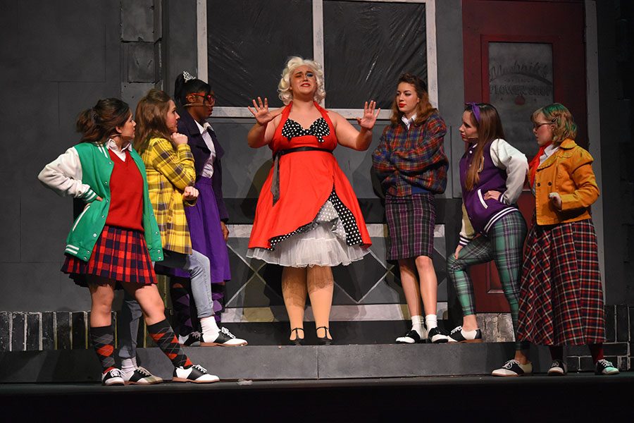 Downtown // Sophomore Jamie Gammon, portraying a frustrated Audrey, sings “Skid Row (Downtown)” while surrounded by the Doo-Wop girls during a dress rehearsal of Little Shop of Horrors Jan 15.