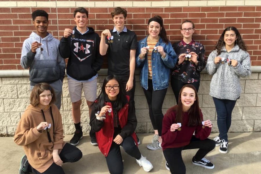 Achieving Artistry // Students in the first division show off their medals. The 70 art students won a total of 103 regional medals at Vase.