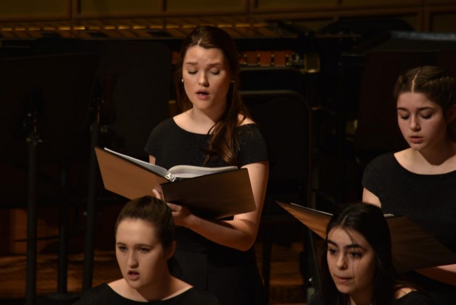 Angelic voices // Senior Jordan Meyer performs with the Women’s choir at the Meyerson Symphony Center. All choirs and bands from the district performed at the Meyerson March 2.