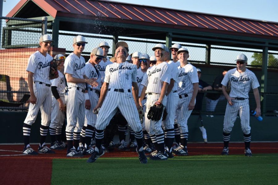Blowing it \\ Junior Gunner Stone does his famous Triple-H introduction as the players are announced before the game begins. The Raiders beat McKinney North 6-4 to advance to the regional quarter finals. 