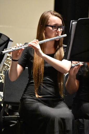 All ears \\ Senior flute player Elizabeth Forte plays in the pre-uil for Symphonic Band