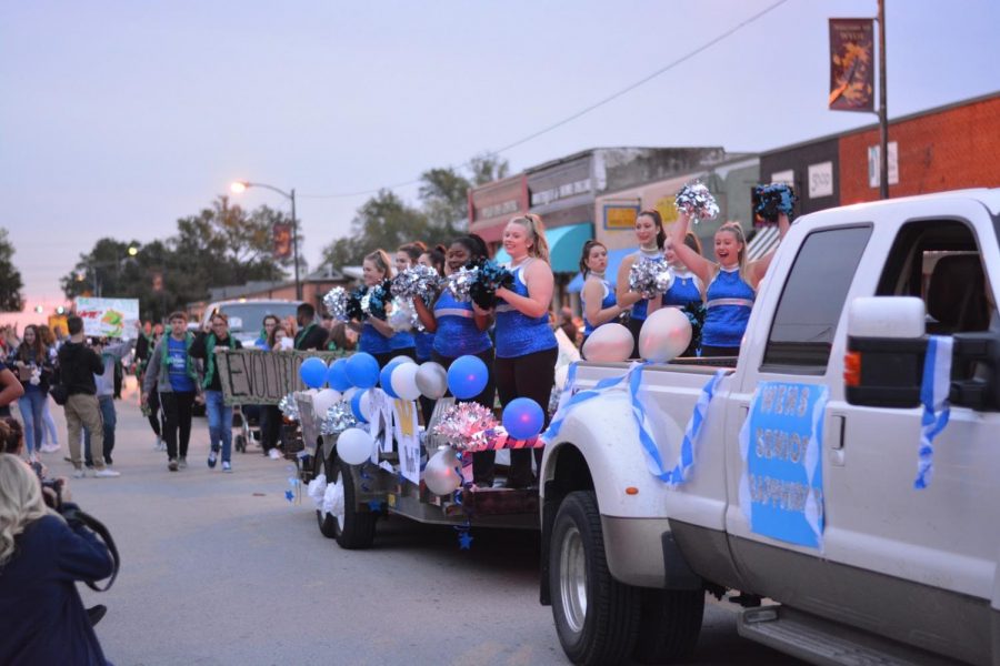 Floatin on by \\ Last years homecoming parade brought out lots of fans. This years theme is Lights, Camera, Raiders! Student Council is seeking entries for this years parade.
