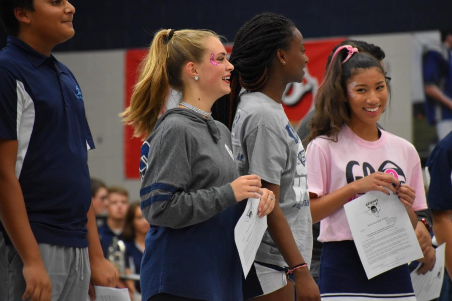 Crownworthy \\ Basking in the moment, junior Audrey Wentz finds out that her peers nominated her for the homecoming court. All nominees were announced during the Pink Out pep rally Oct. 4.