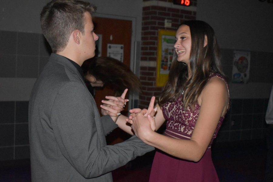 A dance to remember \ Freshman Kirsten Hight enjoys her time at the dance with senior Caed Rodgers. “Even though the music wasn’t the best, I still had a great time with him, Hight said Oct. 19