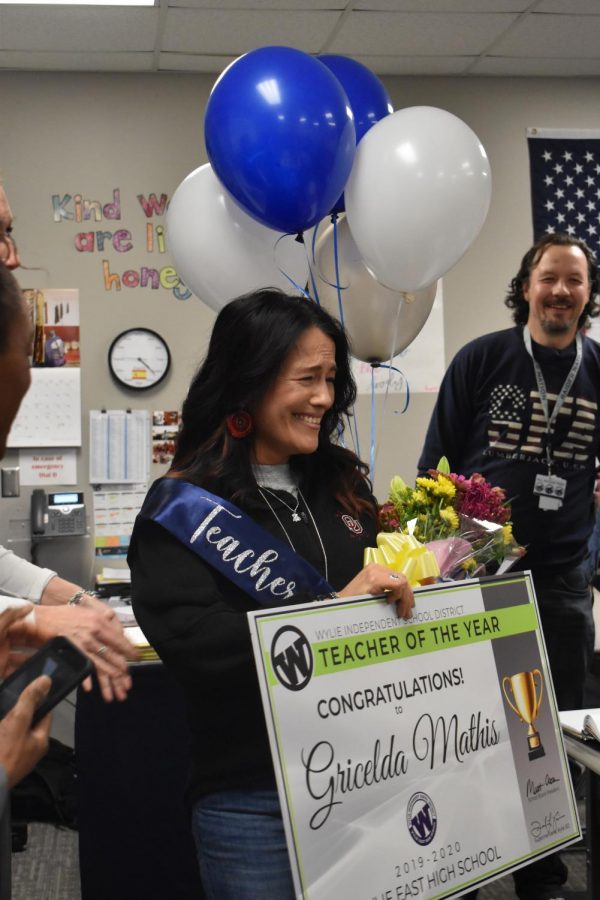Señora surprises \\ Taking in her moment of joy, Spanish teacher and winner of teacher of the year accepts her new title and gifts from the school board and staff. “I am honored and overwhelmed with gratitude to be acknowledged as the Wylie East Teacher of the Year,” Mrs. Mathis said. 