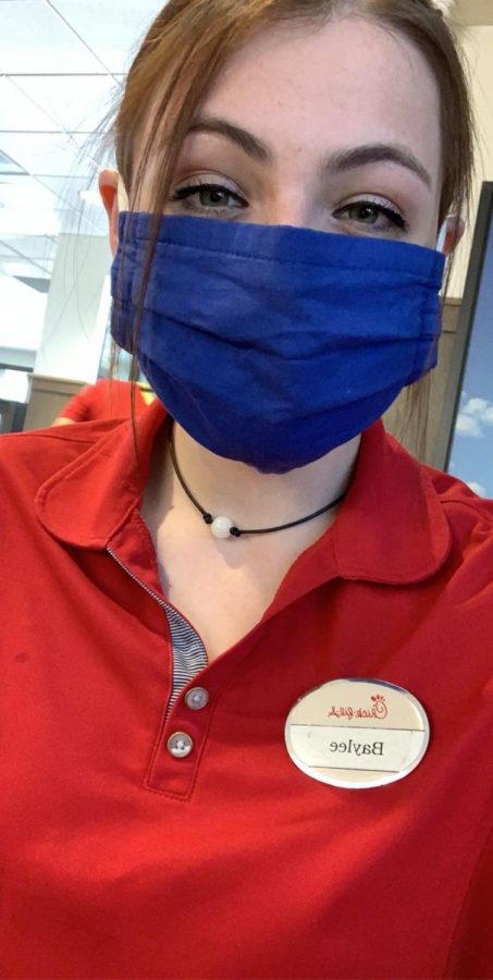 Safety first \\ Senior Baylee Hatch works for an essential business. She is risking her own health to serve others; however, her employer is taking extra safety precautions to keep their workers safe.