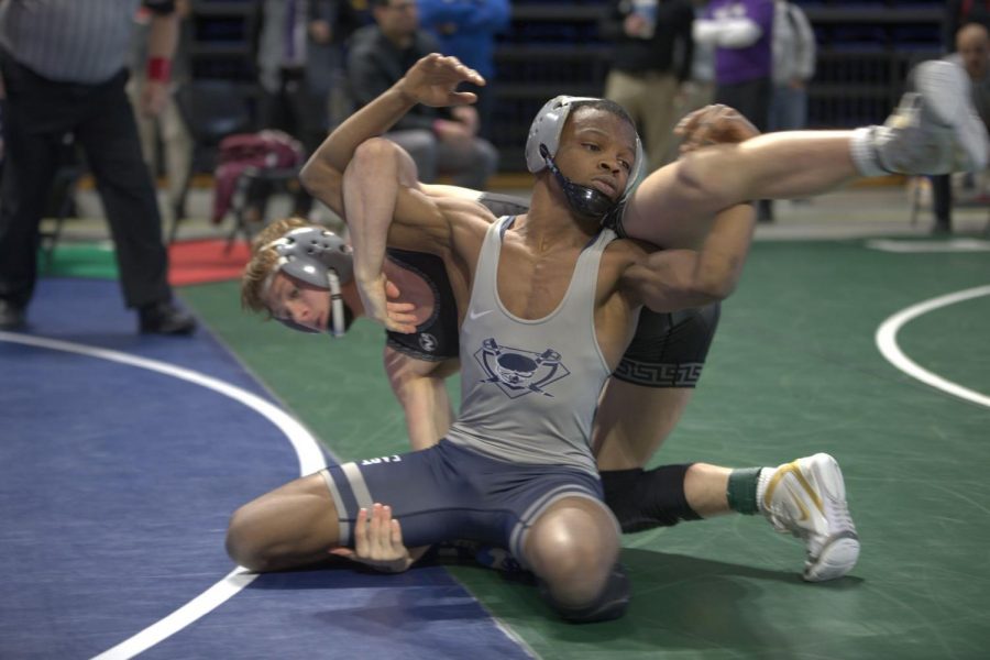 At the top \\ Senior DAndre Brown wins the 5A state championship in his weight class. It was a redemption moment since I didnt win last year, Brown said.