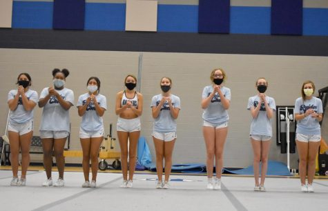 Fair to all \\ Freshmen practice in the gym before school Aug. 25. Cheerleading and drill team are required to wear masks at all times and social distance more than six feet. 