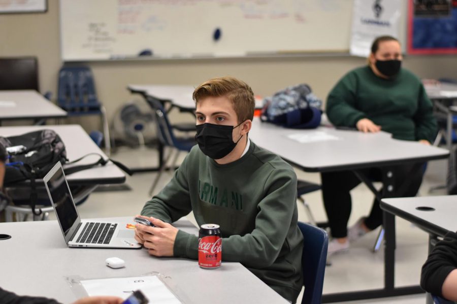 Pay attention \\ Listening to his teammates, sophomore Carson Tittle talks at practice with his Quiz Bowl team. SkillsUSA state competitions will be held virtually this year.