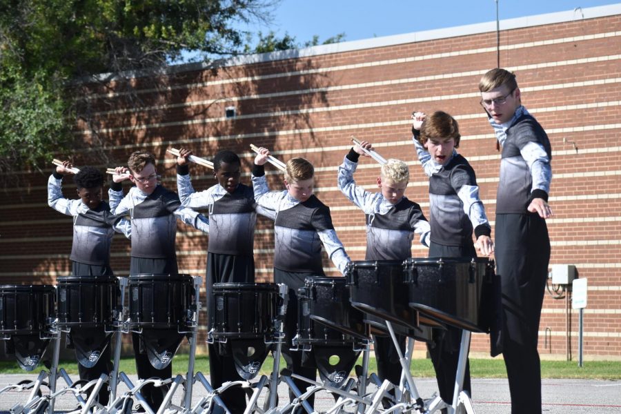 Practicing perfection \\ Rehearsing new Choreography, the Pride of the East’s Snare drumline prepared to perform at their first competition of the 2021 season Sept. 18.
