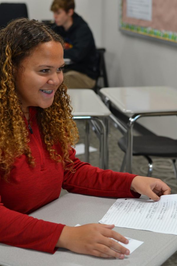 Spanish speaking  \ Freshman Brianna Haskins practices speaking Spanish, March 30. The Spanish class learned words to use for Cinco de Mayo next month. “I like Spanish because I get to learn a new language to use outside of the classroom,” Haskins said. 
