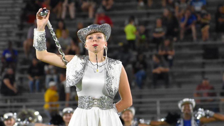 In charge \\ Senior Julia Borsack leads the Sapphires at half time during the first home game of the year Aug. 27.