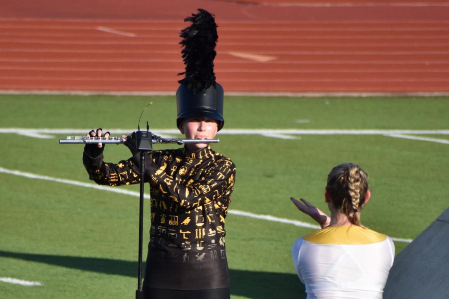 Senior Hanna Harmon performs as a soloist in the 2018 POTE marching show Conquered.  