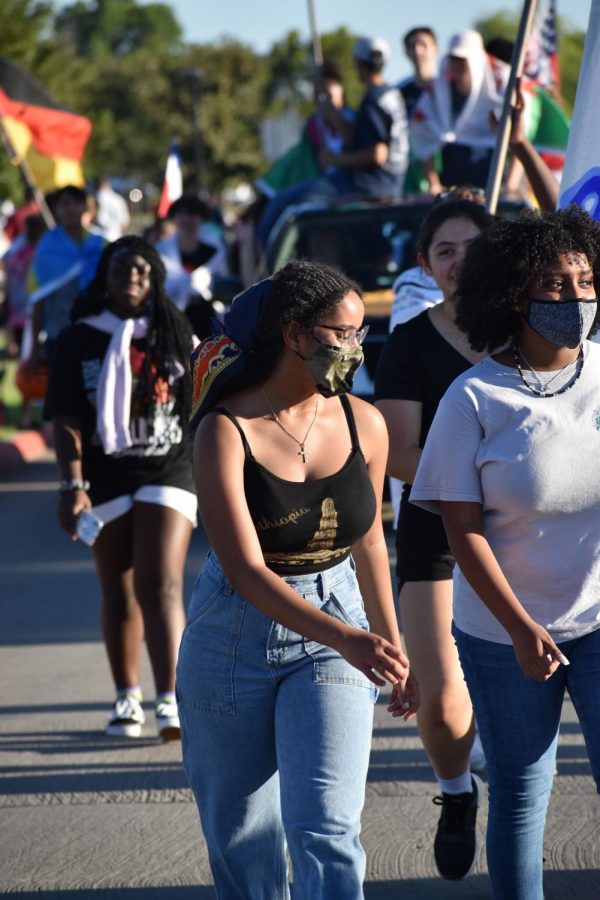 Ethiopian Pride \\ During the homecoming parade, sophomore Elshaddai Solomon repped her home country Ethiopia on her shirt. 
